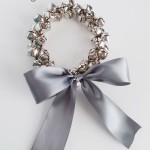 Stylish Jingle Bell Wreath Design with Feminine Touch Used Grey Ribbon and Silver Bell Decoration Ideas