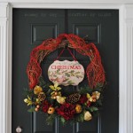 Unique Christmas Wreath Design with Fruit Deecoration and Traditional Door Design for Home Inspiration