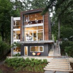 Amazing Building Design of Dorsey Residence with Dark Colored Outer Wall made from Wood and Several Transparent Glass Windows