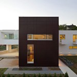 Amazing Building Design of J20 House with Dark Brown Colored Outer Wall which is Made from Wood and Wide Glass Panels