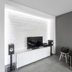 Awesome Living Space Design of Apartment Minimalist Andreja Bujevac with White Colored Wooden Stool and Several Black Home Theater