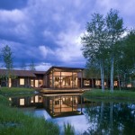 Beautiful Lake House Surrounded by Shady Greenery on Wide Courtyard Cool Glass Wall Offering Open Plan Interior