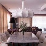 Breathtaking Dining Space Design on Eclectic Apartment Brazil with Spiky Shell Shaped Pendant Lamp Cover and White Colored Marble Dining Table