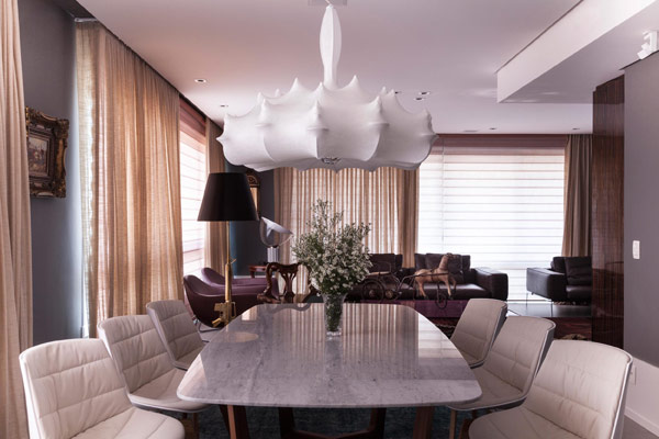 Breathtaking Dining Space Design on Eclectic Apartment Brazil with Spiky Shell Shaped Pendant Lamp Cover and White Colored Marble Dining Table