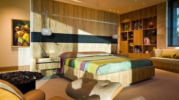 Colorful Striped Bedspread Covering Bed in Paradise Valley Residence Elizabeth Rosensteel Design Studio