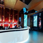 Contemporary Red Wall and Long Shelf in the Sky Club Romania Bar Counter under the Brown Ceiling