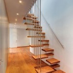 Enchanting Hallway Design of Modern Valna House with Soft Brown Colored Wooden Floor and Soft Brown Wooden Stepping Staircase