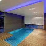 Enchanting Indoor Relaxing Space Design of J20 House with Soft Brown Colored Floor Made from Wooden Material and Little Blue Pool