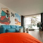 Marvelous Bear House Onion Design Interior with Cartoon Wall Decor and Blue Fabric Sofa in Modern Touch for Family Room Space