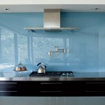 Mesmerizing Mandeville Residence with Sophisticated Kitchen Including Flashy Blue Kitchen Backsplash and Stainless Steel Range Hood Compact Dark Kitchen Corner