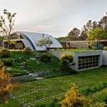 Natural Garden with Green Manicured Turfs Pathway and Mounts Surrounding Arc House Maziar Behrooz