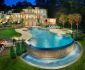 Amazing Swimming Pool Design Idea with Irregular Shape Applied in Custom Dream Homes with Green View and Surroundings