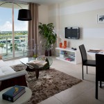 Elegant White Sofa Set Design Idea Applied in Studio Apartment Decorating ideas finished with Cream Curtain Design Ideas