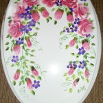 Flower Motifs Applied in Elongated Toilet Seat Covers Equipped with White Color Ideas with Brown Floor