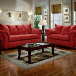 Striking Red Colored Chair Design ideas with Grey Rug with Wooden FLooring and Snows Furntiure Design in Living Space