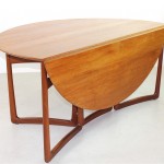 Wonderful Wooden Folding Dining Table in Rounded Shape for the Interesting Dining Space in the House