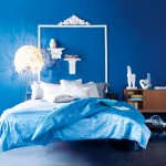 Alluring Floor Lamp beside Stylish Bed and Mesmerizing Blue Bedding in Bedroom with Blue Interior Design Ideas