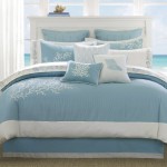 Attractive Blue and White Bedding on White Bed for Comfy Beach Bedroom Themes with White Nightstand