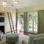 Attractive Grey Curtains for Sliding Glass Doors in Wide Family Room with Black Fireplace and Grey Armsofas