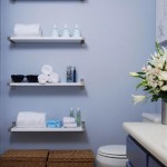 Attractive White Bathroom Wall Shelving Ideas on Blue Wall near Wicker Boxes and Grey Vanity