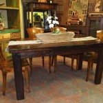 Beautiful Decorative Flowers on Solid Oak Table in Rustic Dining Room Furniture with Glossy Wooden Chairs