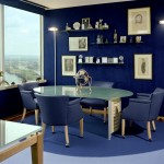 Chic Meeting Room using Blue Interior Design Ideas with Glass Top Table and Blue Armchairs