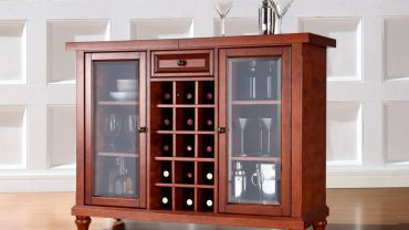 Classic Details on Wooden Cabinet with Glass Doors and Tidy Wine Racks on Laminated Teak Flooring