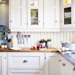 Classic Drawers in White Color for Swedish Kitchen Design Ideas with Wooden Countertop and White Backsplash