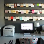 Colorful Papers on Floating Hagers above White Computer Desk for Small Workspace Designs