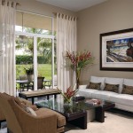 Enchanting Glass Top Coffee Table and Brown Chairs in Sitting Room with Sheer Curtains for Sliding Glass Doors