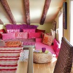 Extraordinary Pink Lathers and Round Wicker Table on Hardwood Flooring in Comfortable Bohemian Apartment Decorating Ideas