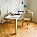 Extraordinary Round Stool and Unusual Desk for Small Workspace Designs with Laminated Oak Flooring