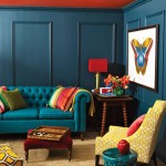 Gorgeous Blue Sofa and Teak Side Table near Blue Painted Wall as Bright Living Room Color Ideas