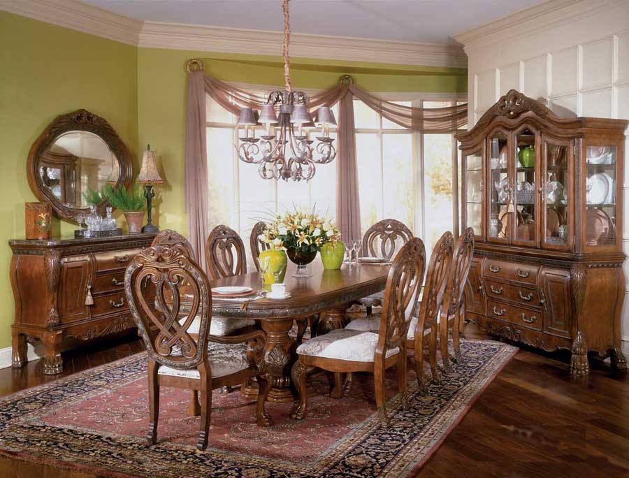 Gorgeous Carving on Antique Dining Room Furniture made of Wood under Stunning Grey Chandelier