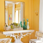 Interesting Wall Mirror above Console Table beside White Chair in Fabulous Room using Yellow Interior Design Ideas