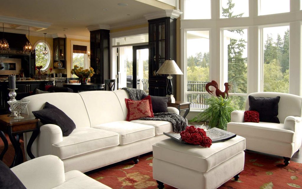 Interesting White Sofas and Ottoman on Flowery Carpet inside Comfortable Living Room Ideas with Small Side Tables
