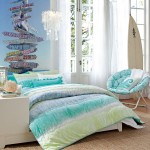 Lovely Blue Chair beside White Bed and Blue Bedding for Beach Bedroom Themes with Unique Decal
