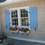 Lovely Blue Color for Exterior Window Shutters on White Framed Windows in Traditional House