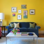 Lovely Wall Arts in Comfy Sitting Room using Bright Living Room Color Ideas with Yellow Wall