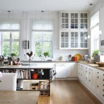 Marvelous White Wall Cabinets above Long Counter and Oak Countertop inside Swedish Kitchen Design Ideas