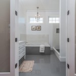Mesmerizing Bathroom behind Stylish French Door Options with  White Vanity on Grey Tile Flooring