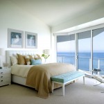 Mesmerizing Glass Doors in Beach Bedroom Themes with Wide Bed and White Nightstands on Carpet Flooring