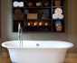Minimalist Black Bathroom Wall Shelving Ideas above Simple White Bathtub and Modern Bathtub Faucet