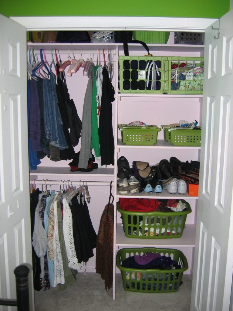 Minimalist White Closet Ideas for Small Bedrooms with Clothes Hangers and Green Baskets in White Shelves