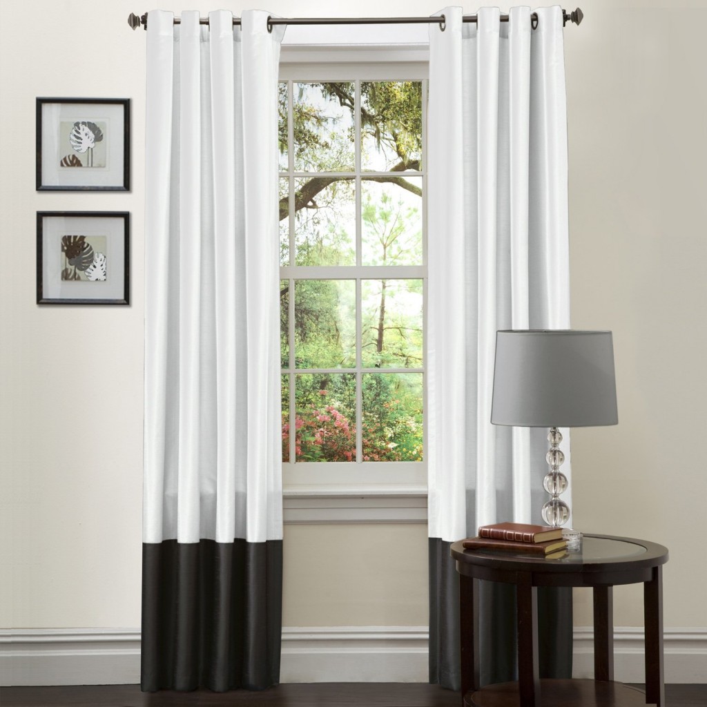 Minimalist White Framed Window and Black and White Curtains near Round Side Table and Modern Table Lamp