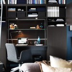 Modern Dark Desk and Grey Swivel Chair under Black Bookshelves for Stylish Small Workspace Designs