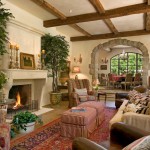 Natural Wooden Beams above Family Space using Mediterranean Living Room Ideas with Cozy Ottomans on Traditional Carpet