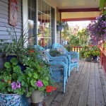 Rustic Wicker Blue Deck Furniture in Traditional Patio with Natural Plantations and Purple Flowers