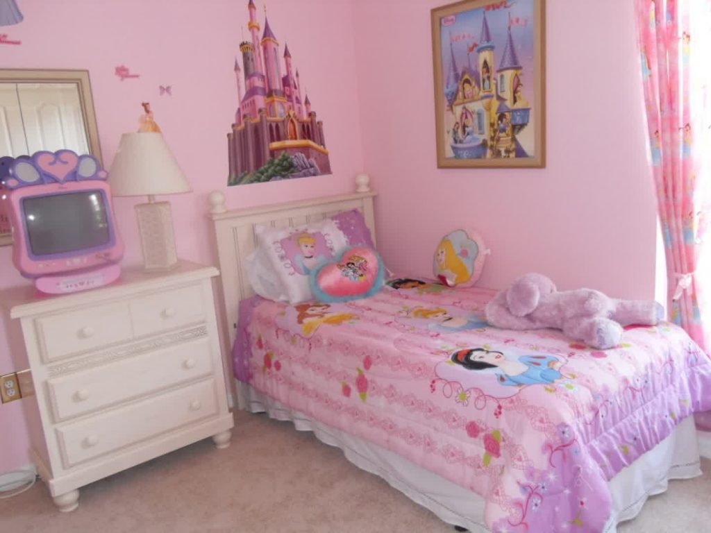 Small Pink Bedroom Ideas for Girls with White Dresser and Single Bed beside Pink Painted Wall