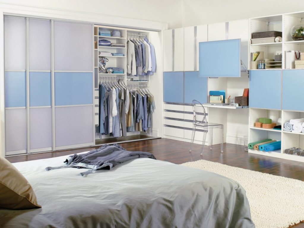 Spacious Bedroom with Stylish Closet Doors Ideas and Floating Desk near Acrylic Chair